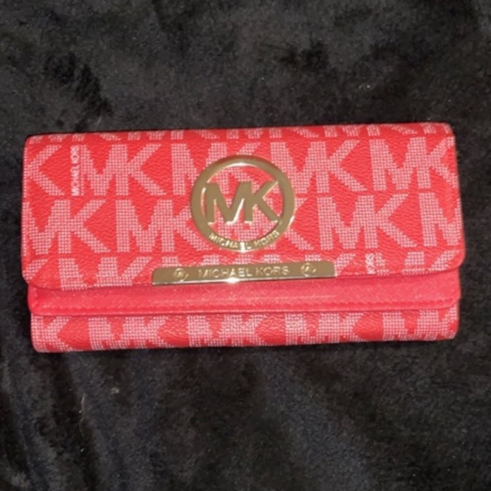 Michael kors red wallet.